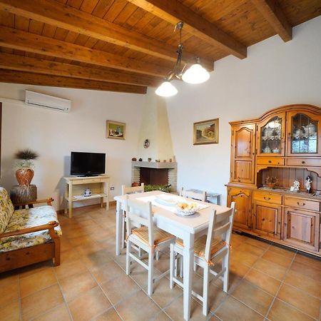L'Oliveto Apartment Nuxis Bagian luar foto