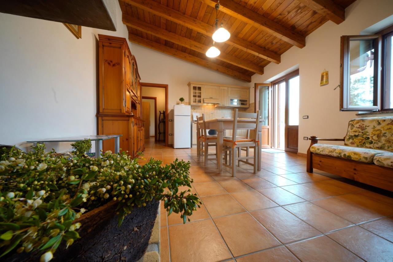 L'Oliveto Apartment Nuxis Bagian luar foto