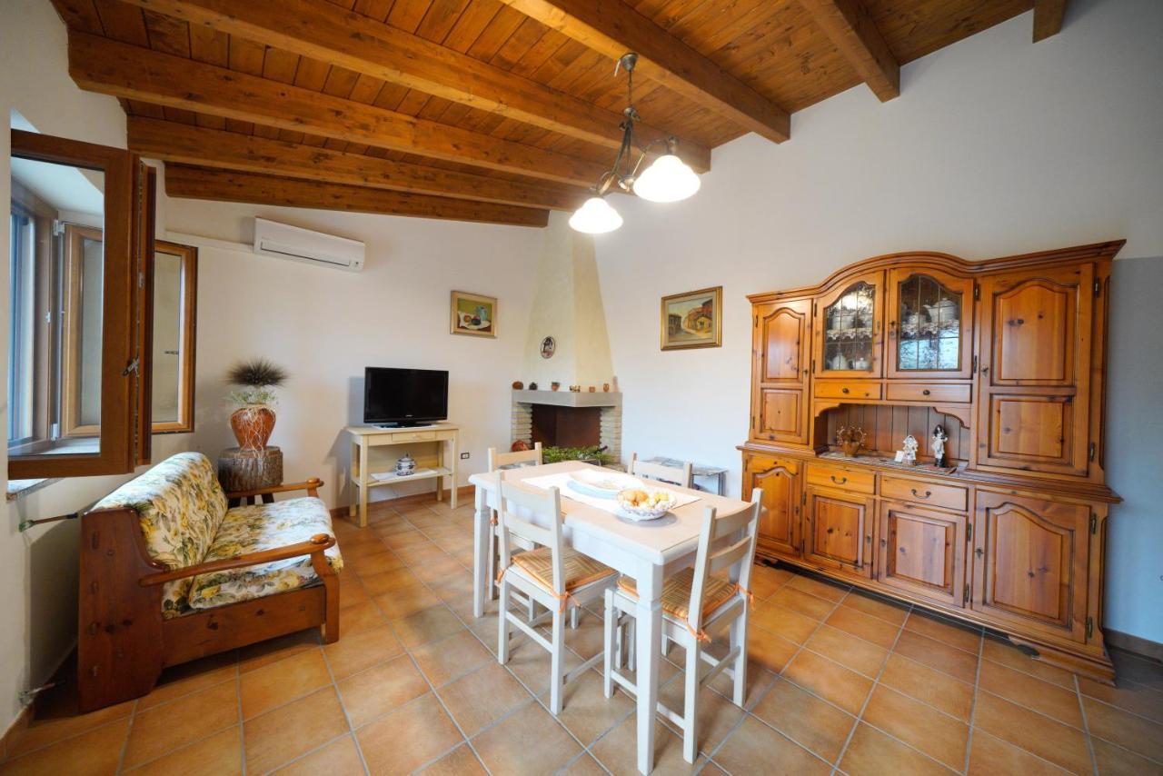 L'Oliveto Apartment Nuxis Bagian luar foto